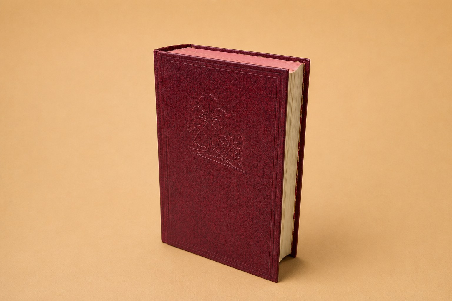 Thick maroon flexible-bound omnibus book, 'Fifty Amazing Stories of the Great War', with gilt lettering on the spine and a gilt-embossed figure on the front cover, published by Odhams Press.