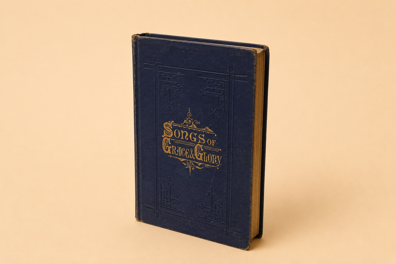Blue cloth-bound Victorian hymnal with gilt ornamental front lettering 'Songs of Grace & Glory' and red page-edges; shown with its 1872 title page (edited by Charles B. Snepp, W. Hunt & Co.), its preface and 'Arrangement of Hymns' pages, and a flyleaf inscribed in ink 'Mary Hawes 1874'.